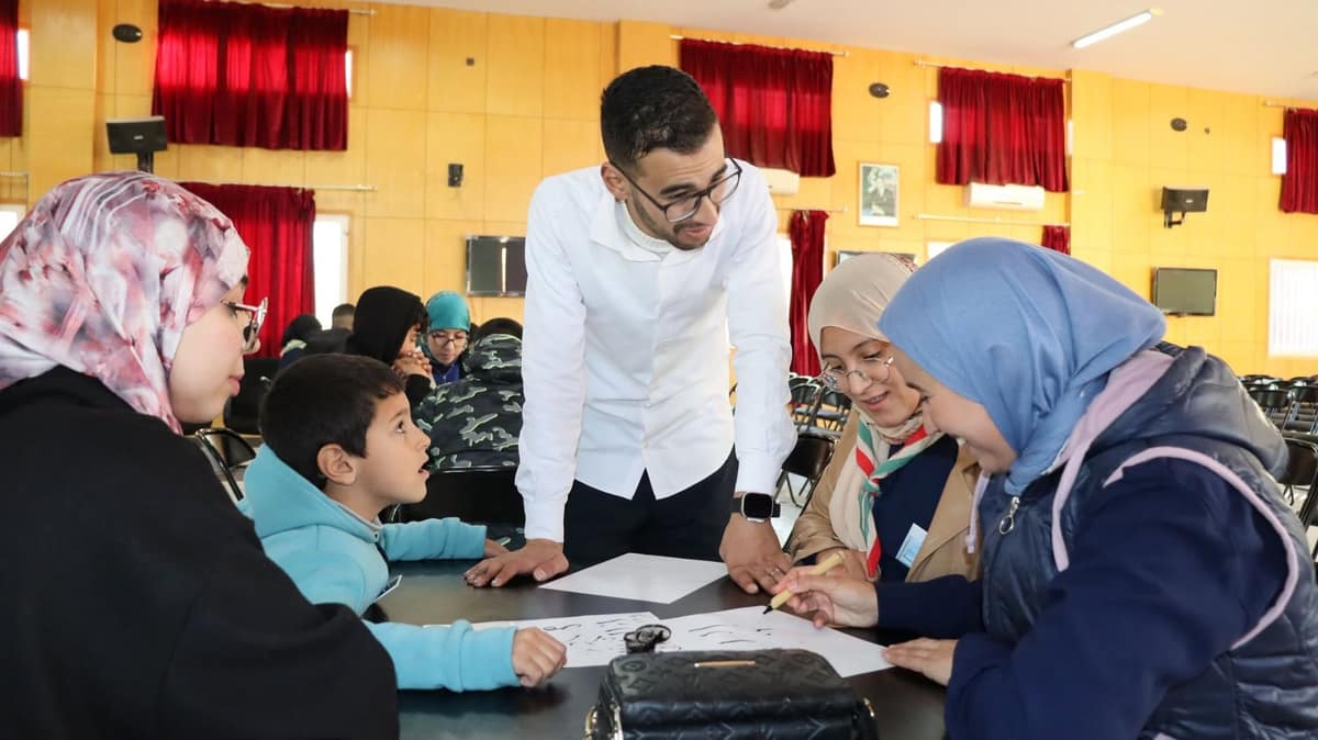 Participants learning during a cultural calligraphy exhibition.
