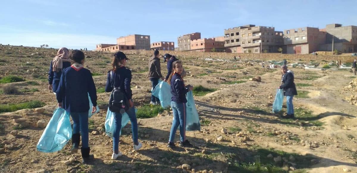 Scouts gathered during a community cleanup action.