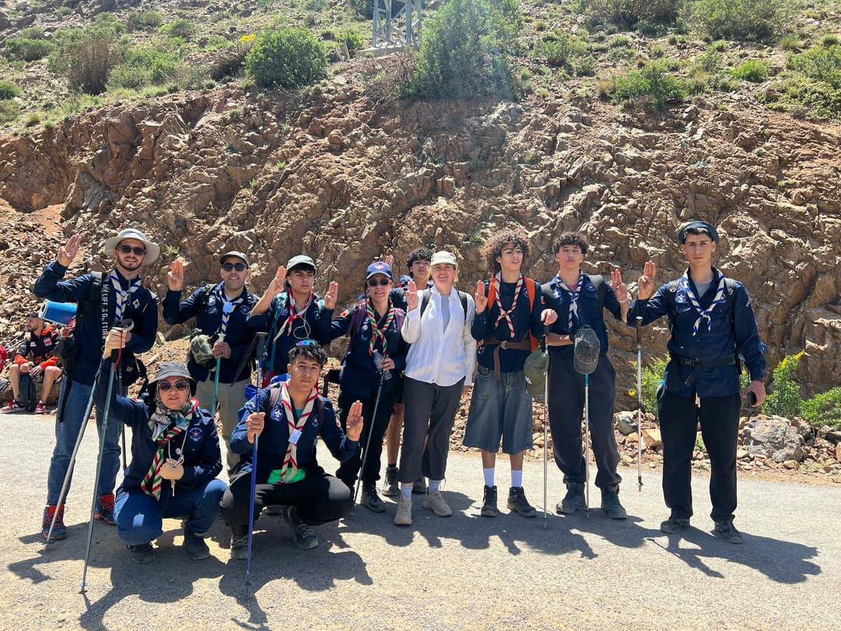 Scouts gathered in the mountains during a peace-centered trek.